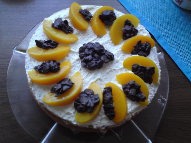 Frischkäsetorte mit Pfirsichen und Schoko-Crossies | Kochmeister Rezept