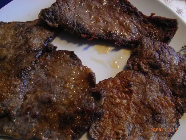 Rinderschnitzel in würzige Sauce