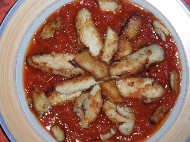 Hühnerbrustscheiben auf Tomaten-Vinaigrette
